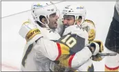  ?? GRAHAM HUGHES — THE CANADIAN PRESS VIA AP ?? Vegas’ Max Pacioretty, left, congratula­tes Nicolas Roy on his Game 4-winning goal in overtime against Montreal.