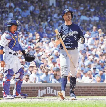  ?? GETTY IMAGES ?? Ryan Braun strikes out in the second inning Saturday in Chicago. Braun drove in the only run for the Brewers on Saturday.