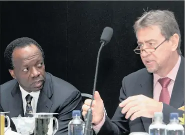  ?? PHOTO: SIMPHIWE MBOKAZI ?? FirstRand chief executive Sizwe Nxasana (left) is to step down from his position as chief executive in October and will be succeeded by his deputy, Johan Burger (right).