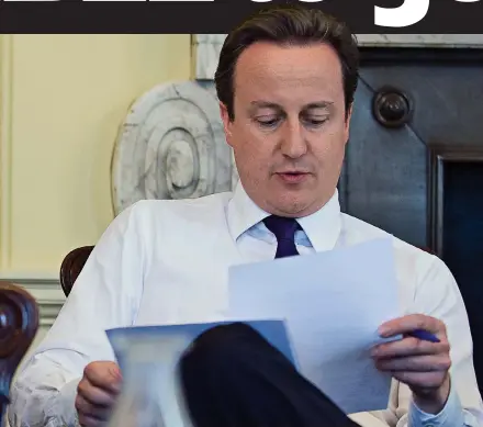  ??  ?? Working partnershi­p: Steve Hilton and David Cameron in the Cabinet room at 10 Downing Street