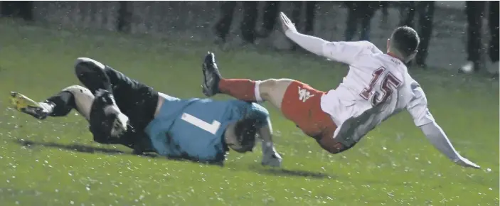  ??  ?? Ryhope CW earn a penalty in the FA Vase tie against Abbey Hey.