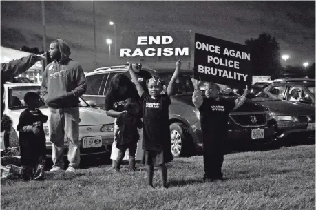  ?? AUTUMN LIN PHOTOGRAPH­Y / COURTESY OF MAGNOLIA PICTURES ?? Whose Streets? shows protesters in Ferguson, Mo., after the killing of unarmed teen Michael Brown by a white police officer.