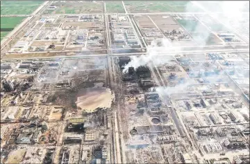  ??  ?? An aerial view shows a chemical plant after an explosion in Yancheng in China’s eastern Jiangsu province. — AFP photo