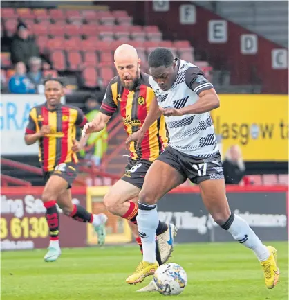  ?? ?? Ayr United’s Francis Amartey sets off on an attack as the Honest Men tried to gain the upper hand.