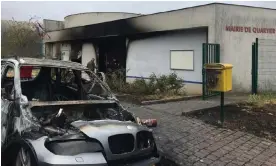  ?? Photograph: Radio France ?? The town hall of Borny, a district of the eastern French city of Metz, was damaged in rioting in the neighbourh­ood.