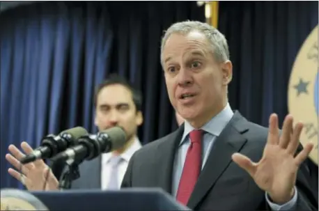  ?? ASSOCIATED PRESS ?? In this March 21, 2016, photo, New York Attorney General Eric Schneiderm­an speaks during a news conference in New York. Schneiderm­an, who had taken on high-profile roles as an advocate for women’s issues and an antagonist to the policies of President...