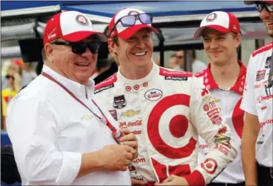  ?? AJ MAST — THE ASSOCIATED PRESS ?? Scott Dixon and car owner Chip Ganassi celebrate after winning the pole for the Indianapol­is 500 in 2015. After over 25 years, Target will leave as a sponsor in IndyCar after the season.