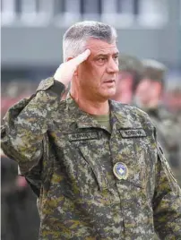  ?? ARMEND NIMANI AGENCE FRANCE-PRESSE ?? Le président Hashim Thaci, photograph­ié en uniforme lors d’une inspection des Forces de sécurité du Kosovo en 2018