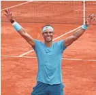  ?? GETTY IMAGES ?? Rafael Nadal celebrates his 11th French Open crown after defeating Dominic Thiem. He has a career mark of 86-2 in the tournament.