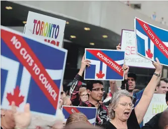  ?? STEVE RUSSELL TORONTO STAR ?? Hundreds gather outside in protest as Toronto City Council debates an emergency motion pertaining to Premier Doug Ford's plan to cut the size of Toronto’s council down to 25 seats.