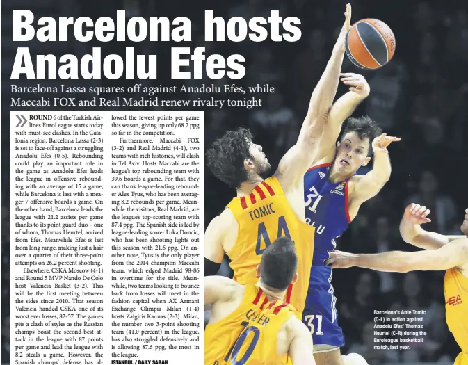  ??  ?? Barcelona’s Ante Tomic (C-L) in action against Anadolu Efes’ Thomas Heurtel (C-R) during the Euroleague basketball match, last year.