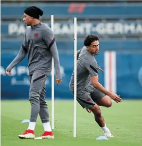  ?? ?? Men at work: paris st Germain’s marquinhos (right) and Kylian mbappe going through the paces during a training session ahead of their clash against manchester City. — reuters