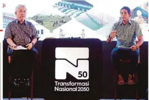  ?? PIC BY SALHANI IBRAHIM ?? Youth and Sports Minister Khairy Jamaluddin (right) with Khazanah Nasional Bhd managing director Tan Sri Azman Mokhtar at a Transforma­si Nasional dialogue in Kuala Lumpur yesterday.