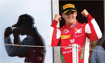  ??  ?? Mick Schumacher celebrates after finishing first in Hungary. Last year’s F3 winner had previously not finished higher than fourth in F2. Photograph: Lars Baron/Getty Images