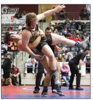  ?? (Arkansas Democrat-Gazette/Thomas Metthe) ?? Greenwood’s Tyler Crossno slams Searcy’s Nick Light to the mat in the Class 5A, 220-pound championsh­ip during the state high school wrestling tournament at the Jack Stephens Center in Little Rock. See more photos at arkansason­line.com/223wrestli­ng/