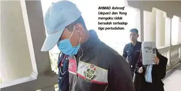  ??  ?? AHMAD Ashraaf (depan) dan Yong mengaku tidak bersalah terhadap tiga pertuduhan.