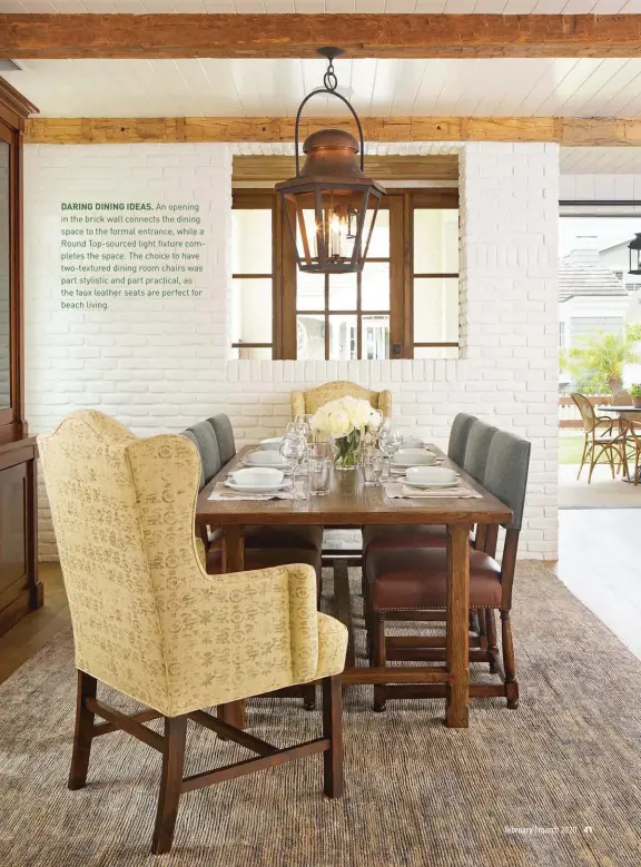  ??  ?? DARING DINING IDEAS. An opening in the brick wall connects the dining space to the formal entrance, while a Round Top-sourced light fixture completes the space. The choice to have two-textured dining room chairs was part stylistic and part practical, as the faux leather seats are perfect for beach living.