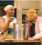  ?? ?? Bjorn Dupaty, left, and Israel Erron Ford in Katori Hall’s “The Hot Wing King” at Hartford Stage through March 24.