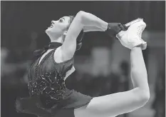  ?? GEOFF ROBINS/AFP/GETTY IMAGES ?? Kaetlyn Osmond is in first place after the short program Friday at Skate Canada Internatio­nal in Regina.