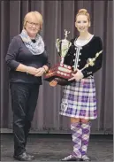  ?? SUBMITTED ?? Emma Hines received the Jeana English Memorial Award, presented by Beth Nicholson, Jeana’s grandmothe­r.