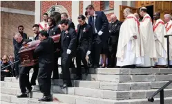  ?? ANDREW FRANCIS WALLACE/TORONTO STAR ?? Pallbearer­s carry a casket with the body of Anne Marie D’Amico at St. Clare Roman Catholic Church on Wednesday.