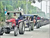  ?? SAMEER SEHGAL/HT ?? Farmers march towards Delhi in their tractors in Amritsar on Wednesday.