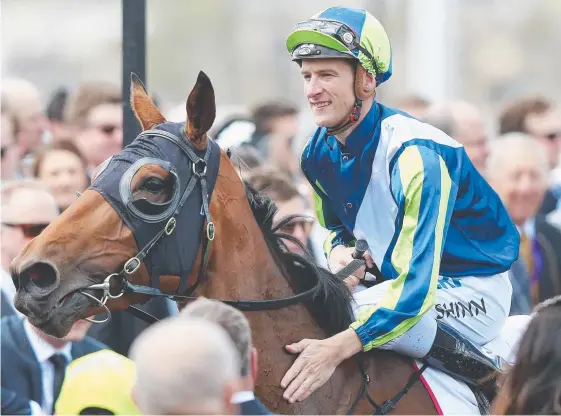  ?? Picture: GETTY IMAGES ?? Jockey Blake Shinn returns to scale after winning on Luvaluva on Derby Day at Flemington.