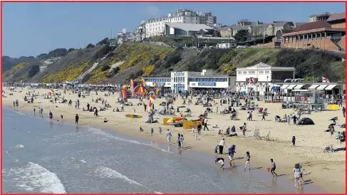  ?? Picture: ANDREW MATTHEWS, DOMINIC LIPINSKIT / PA AND PAUL KINGSTON / NNP ?? Crowds flocked to the beaches in Bournemout­h, Dorset, as the Easter Bank Holiday warmed up yesterday. Meanwhile, beautiful conditions greeted walkers in the Lake District in Cumbria