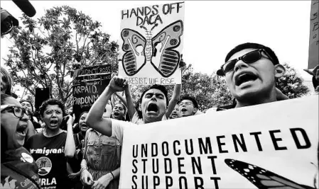  ?? FREDERIC J. BROWN/GETTY-AFP ?? Young immigrants and supporters rally in support of DACA on Friday in Los Angeles. A decision is expected Tuesday.