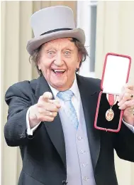  ??  ?? KING OF COMEDY: Sir Ken Dodd with knighthood