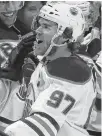  ?? JOHN E. SOKOLOWSKI • USA TODAY SPORTS ?? Edmonton Oilers forward Connor Mcdavid (97) celebrates a goal against the Toronto Maple Leafs in NHL action last season.
