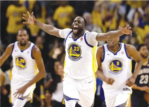  ?? MARCIO JOSE SANCHEZ/ AP ?? Draymond Green, celebratin­g a basket in Game 1 against the Pelicans, has the highest individual net rating of any starter in the postseason.