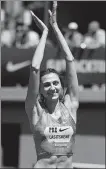  ??  ?? Three-time high jump world champion Mariya Lasitskene will be a favorite at the Tokyo Games after Russia named her in its 10-person athletics team.