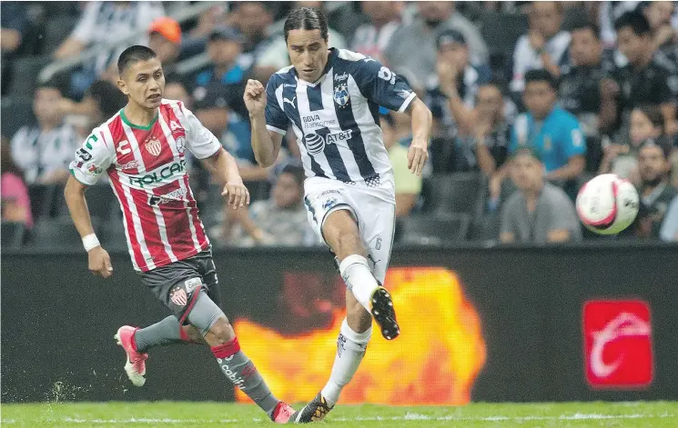  ?? — GETTY IMAGES FILES ?? Efrain Juarez, right, in action for Monterrey against Necaxa in Monterrey, Mexico, in 2017. Juarez is with the Vancouver Whitecaps on a two-year contract.