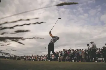  ?? GERALD HERBERT ASSOCIATED PRESS ?? Cameron Smith of Australia plays from the 5th tee Saturday at the British Open. Smith started the day with a twoshot lead but took a double bogey on the 13th hole and was four shots behind leaders Rory McIlroy and Viktor Hovland heading into Sunday’s final round.