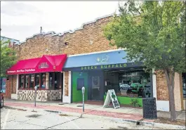  ?? LANDSBERGE­R/ THE OKLAHOMAN] ?? The Green Buffalo located at 784 Asp Ave. in Norman is a newer dispensary on Campus Corner. Despite colleges around the state still banning medical marijuana, owner Joe Wilson thinks he has the best location in the state. [CHRIS