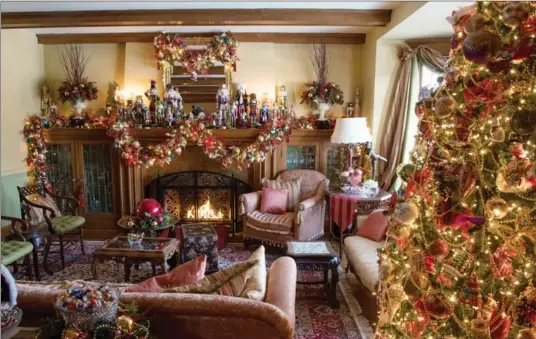  ?? PHOTOS BY SCOTT GARDNER, THE HAMILTON SPECTATOR ?? The main living room of Tom Couchman and David Wood’s home in the St. Clair area. Each year, they host a gathering for about 100 neighbours.