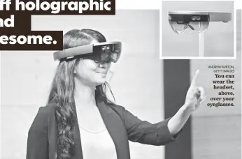  ?? DAVID PAUL MORRIS, BLOOMBERG ?? A woman tests out the HoloLens augmented-reality headset in San Francisco in April.