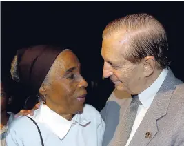  ?? FILE ?? Edward Seaga, then distinguis­hed fellow at the UWI, greets Dr Olive Lewin before the CPTC launch of a video documentar­y of folk music on March 20, 2008.