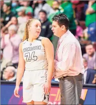  ?? David G. Whitham / For Hearst Connecticu­t Media ?? Thomaston’s Emma Sanson, left, and coach Robert McMahon talk during the CIAC Class S championsh­ip game against Coventry at Mohegan Sun Arena on Saturday.