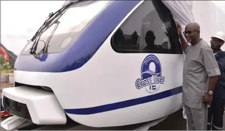  ??  ?? Cross River State Governor, Senator Liyel Imoke, inspecting one of the coaches of the Calabar monorail project at the Tinapa terminal in Calabar... yesterday