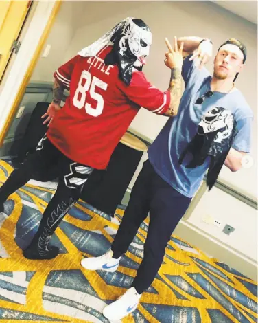  ?? George Kittle 2019 ?? Above, George Kittle poses with wrestler Pentagon Jr. Kittle often celebrates by forming a circle with his thumb and index finger with the other three fingers pointed outward in a tribute to Pentagon Jr., who is known for the “no fear” signal. Below, Kittle and Dante Pettis show how it’s done after a first down.