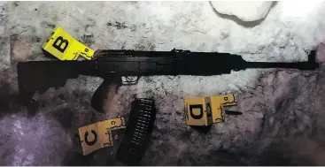  ?? SURETE DU QUEBEC VIA THE CANADIAN PRESS ?? This photo of an assault-style rifle found at the scene of the shooting at a Quebec City mosque was released at the sentencing hearing for Alexandre Bissonnett­e.