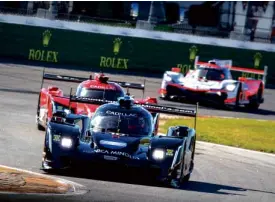  ??  ?? Over winner #10 Konica Minolta Cadillac DPI-VR, Cadilla DPI, P; Jordan Taylor, Renger Van Der Zande, Fernando Alonzo, Kamui Kobayashi