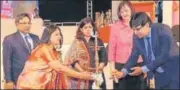  ?? HT PHOTO ?? Indraprast­ha Chairman AS Rana with MD Dr Rajesh Hassija and chief guest lighting the lamp.