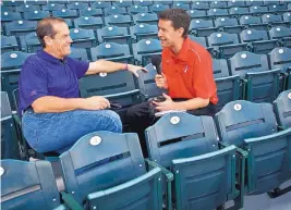  ?? MARLA BROSE/JOURNAL FILE ?? Josh Suchon interviews Colorado Rockies owner Dick Monfort in 2015. Suchon, who calls Isotopes games on the radio, isn’t sure what his future holds with minor league baseball seasons having been canceled this year.