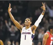  ?? Associated Press file photo ?? Christian Vital’s former coach at St. Thomas More Prep, Jere Quinn, believes Vital will ultimately return to UConn for his junior season.