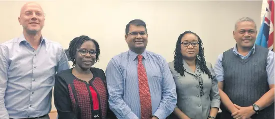  ?? Photo: Pacific Financial Inclusion Programme ?? From left: Pacific Financial Inclusion Programme manager Bram Peters, Bank of Sierra Leone (BSL) head of legal affairs division Mona Kabba, Governor of the Reserve Bank of Fiji Ariff Ali, senior manager of the BSL banking supervisio­n department Rugiatu...