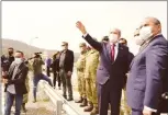  ??  ?? Ersin Tatar and Ali Murat Başçeri (right) visiting the Geçitköy dam on World Water Day