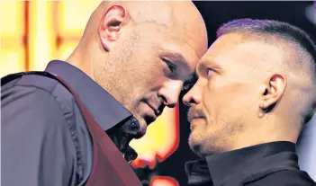  ?? ?? Ready to go: Tyson Fury faces his most important fight since first becoming heavyweigh­t champion in 2015 when he takes on Oleksandr Usyk on Saturday: Fury and Usyk square up in Riyadh (left)